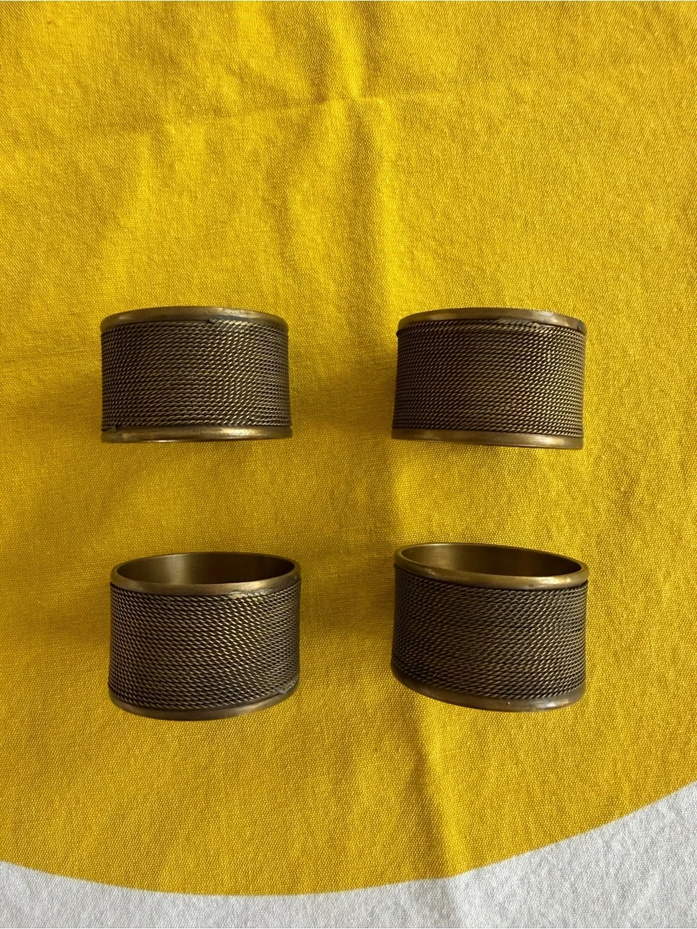 Textured Metal Napkin Rings Set of 4 - dark gold tone